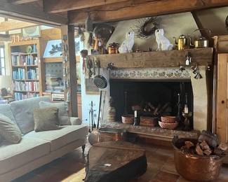 Fireplace room. Many antiques on and around the mantel.