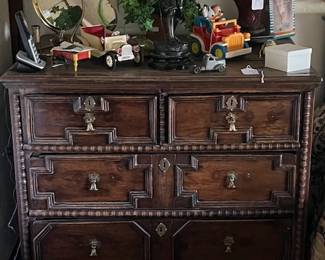 Jacobean style chest of drawers. Very Good cond. Dimensions: 36W x 24D x32.5T.