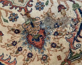 Damage to rug in 2 places