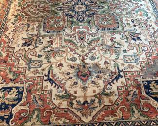 Rug has damage but could be covered by furniture