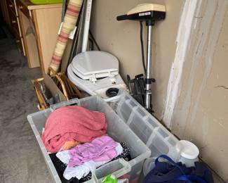 trolling motor, roll of fabric, nice clothes
