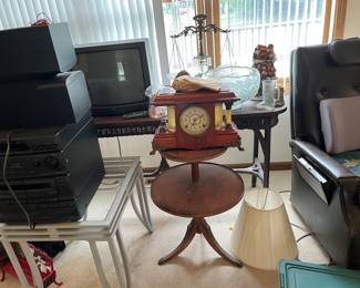 scales of justice, antique tables and clock, electric recliner