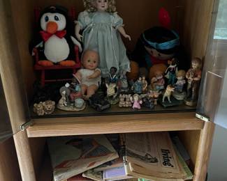dolls, trinkets, books