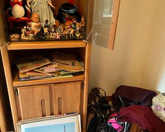 antique dolls, vintage books, purses, art, entertainment center