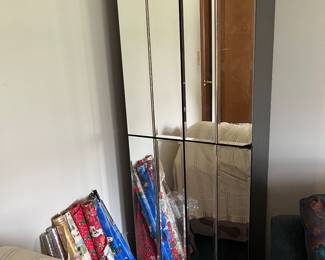 mirrored cabinet, wrapping paper