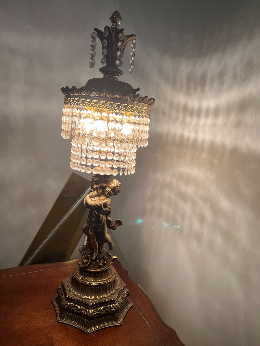 Pair of table top Cupid with prisms $300 for set or best offer