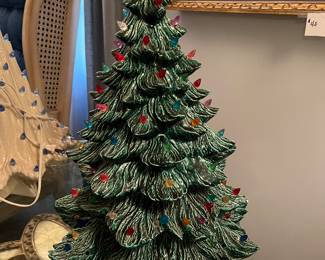Vintage ceramic Christmas Tree sits atop a windup music box. Plays Christmas songs