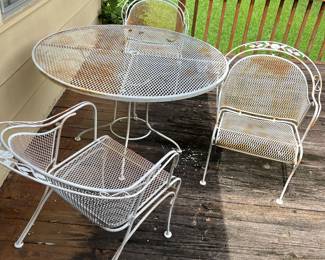 Vintage mid century wrought iron patio furniture. 1 table and 3 chairs. $200 obo