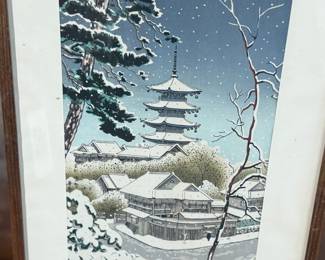 "Pagoda of Ninnaji Temple in Snow", a Japanese woodblock print by listed artist, Benji Asada. Measures in frame, 20” H x 14.75” W. Benji Asada was a Kyoto-based woodblock print artist and painter active in the Sosaku Hanga (Creative Print) movement during the early 20th century. He trained at the Kyoto City School of Fine Arts and Crafts, as well as the Kyoto City Specialist School of Painting.