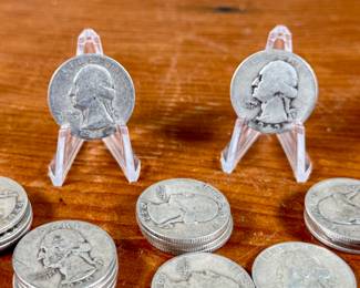 This lot features a collection of pre-1964 silver quarters. $5.00 total face value which includes twenty (20) silver quarters.