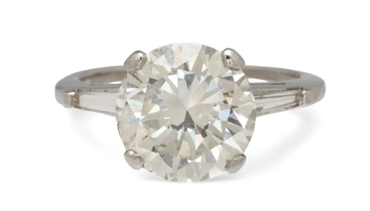 Lot 1
3.8 Carat Round Brilliant Diamond And Platinum Ring Size 5.5