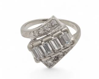 Lot 17
Diamond And 14k White Gold Lady's Ring 1950, Size 4.5 4 g