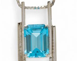 Lot 22
Blue Topaz Pendant, 18.50ct. 25 g