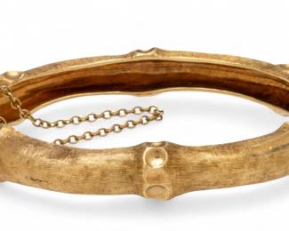 Lot 68
14k Yellow Gold Bangle Bracelet, Hinged 1950, 47.1cm W 2.5" 35 g 1 PC