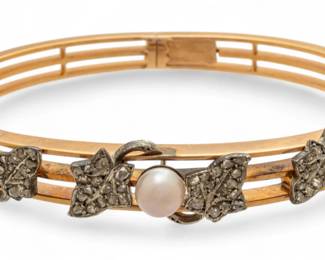 Lot 63
French 18k White And Yellow Gold Bracelet, Old Mine Cuts And Single Pearl 1930, 48cm W 2.175" 26 g