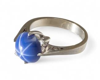 Lot 54
White Gold Lady's Ring, Blue Star Sapphire, Size 7 1/4 1950, 5 g