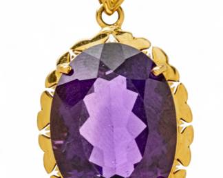 Lot 61
18K Gold And Amethyst Pendant H 19mm W 15mm 7 g