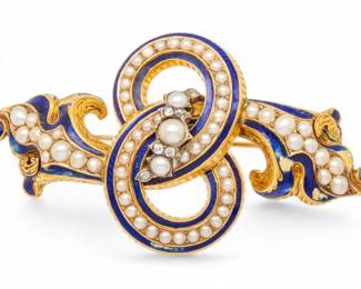 Lot 38
14K Yellow Gold And Blue Enamel Brooch 1940, W 2.5" 16 g