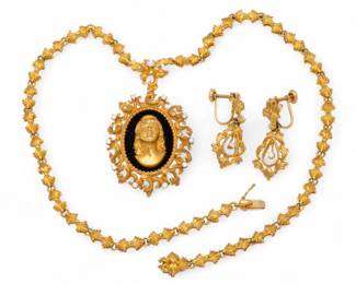 Lot 13
18k Yellow Gold And Diamond Necklace And Earring Set 42 g 3 PCS