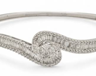 Lot 46
14k White Gold And Diamond Hinged Bangle Bracelet 53.5cm W 2.5" 16 g