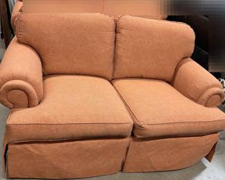 Upholstered Orange Colored Love Seat