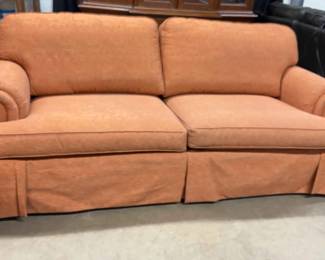 Orange Colored Upholstered Sofa W Rolled Arms