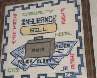 Framed needlepoint- insurance themed