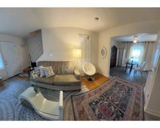 Living room set, couch, chairs, tables, rugs, lamps, curtains