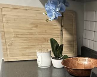 cutting board, candles, bowls