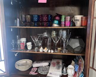 Colorful glasware, plant stands, plates, cake pop maker, party supplies