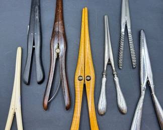 An interesting collection of antique glove stretchers in sterling silver, wood, and bone….