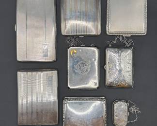 A unique collection of sterling silver cigarette cases (also great for bills and credit cards), and antique dance and coin purses. 