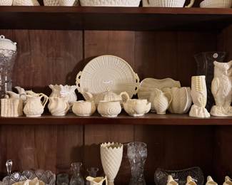 An extensive decades old Belleek collection including Classic Shamrock, Basketweave, Limpet, Neptune, and more. 