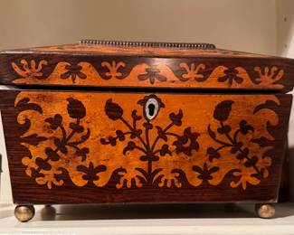 Antique rosewood tea caddy with fitted interior. 
