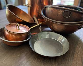 Collection of copper pots, pans, sauté pans, mixing bowls 