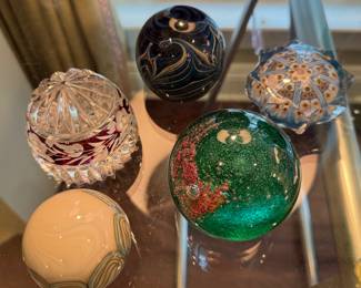Handblown glass paperweights, signed 