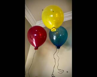 Mouth blown glass balloons with wire "string" complete with hanging method for ceiling placement.  Purchased circa 2000 from an art gallery in Venice, California.  Artist unknown