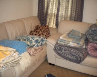 Matching sofa and love seat. More bedding 
