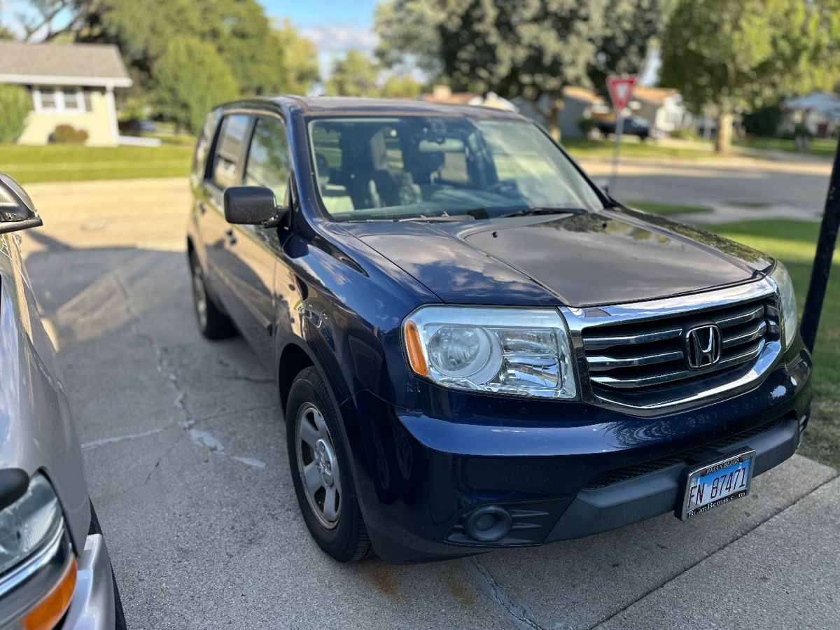 2014 Honda pilot see carfax cover asking 14,000 buy it now