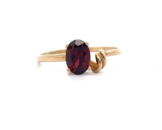 Oval Red Garnet Love Knot Ring in Yellow Gold