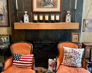 Gorgeous pair of leather chairs, embroidered pillows, and original artwork 