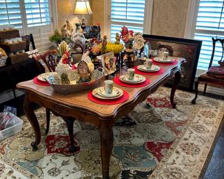 Beautiful area rug and dining room table & chairs 