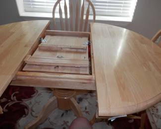 Butterfly leaf hides within table