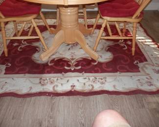 60 inch X 84 inch wool sculptured rug....cranberry and ivory basics