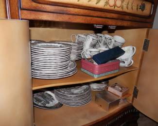 The dishes under the sideboard