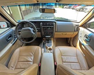 2000 JEEP CHEROKEE SPORT 4x4 / LEATHER / SINGLE OWNER / 75k ORIGINAL MILES | 74,675 original miles, one owner, clean carfax!
VIN: 1J4FF48S8YL231397. Purchased new from Biltmore Motors in Rye, NY c. 2000 - always garaged in an important Scarsdale, NY home.
All service records from 25 years of ownership. Forest Green Pearl paint and Camel brown leather interior.
Original window sticker describes Sport Value Group optional equipment:
Air Conditioning
Power Windows, Locks, Mirrors
Keyless Entry
Leather wrapped wheel
plus anti lock brakes, automatic transmission, factory tinted rear windows, fog lamps, cruise (speed) control, full size spare, 15 in. aluminum rims, only aftermarket add is a cd-changer under the rear seat.
