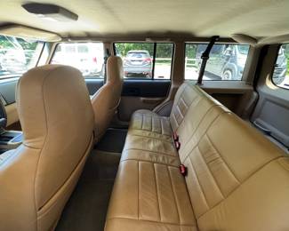 2000 JEEP CHEROKEE SPORT 4x4 / LEATHER / SINGLE OWNER / 75k ORIGINAL MILES | 74,675 original miles, one owner, clean carfax!
VIN: 1J4FF48S8YL231397. Purchased new from Biltmore Motors in Rye, NY c. 2000 - always garaged in an important Scarsdale, NY home.
All service records from 25 years of ownership. Forest Green Pearl paint and Camel brown leather interior.
Original window sticker describes Sport Value Group optional equipment:
Air Conditioning
Power Windows, Locks, Mirrors
Keyless Entry
Leather wrapped wheel
plus anti lock brakes, automatic transmission, factory tinted rear windows, fog lamps, cruise (speed) control, full size spare, 15 in. aluminum rims, only aftermarket add is a cd-changer under the rear seat.