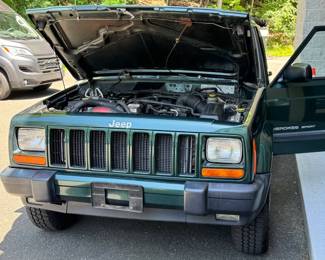 2000 JEEP CHEROKEE SPORT 4x4 / LEATHER / SINGLE OWNER / 75k ORIGINAL MILES | 74,675 original miles, one owner, clean carfax!
VIN: 1J4FF48S8YL231397. Purchased new from Biltmore Motors in Rye, NY c. 2000 - always garaged in an important Scarsdale, NY home.
All service records from 25 years of ownership. Forest Green Pearl paint and Camel brown leather interior.
Original window sticker describes Sport Value Group optional equipment:
Air Conditioning
Power Windows, Locks, Mirrors
Keyless Entry
Leather wrapped wheel
plus anti lock brakes, automatic transmission, factory tinted rear windows, fog lamps, cruise (speed) control, full size spare, 15 in. aluminum rims, only aftermarket add is a cd-changer under the rear seat.