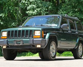 2000 JEEP CHEROKEE SPORT 4x4 / LEATHER / SINGLE OWNER / 75k ORIGINAL MILES | 74,675 original miles, one owner, clean carfax!
VIN: 1J4FF48S8YL231397. Purchased new from Biltmore Motors in Rye, NY c. 2000 - always garaged in an important Scarsdale, NY home.
All service records from 25 years of ownership. Forest Green Pearl paint and Camel brown leather interior.
Original window sticker describes Sport Value Group optional equipment:
Air Conditioning
Power Windows, Locks, Mirrors
Keyless Entry
Leather wrapped wheel
plus anti lock brakes, automatic transmission, factory tinted rear windows, fog lamps, cruise (speed) control, full size spare, 15 in. aluminum rims, only aftermarket add is a cd-changer under the rear seat.
