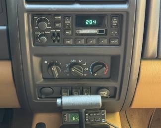2000 JEEP CHEROKEE SPORT 4x4 / LEATHER / SINGLE OWNER / 75k ORIGINAL MILES | 74,675 original miles, one owner, clean carfax!
VIN: 1J4FF48S8YL231397. Purchased new from Biltmore Motors in Rye, NY c. 2000 - always garaged in an important Scarsdale, NY home.
All service records from 25 years of ownership. Forest Green Pearl paint and Camel brown leather interior.
Original window sticker describes Sport Value Group optional equipment:
Air Conditioning
Power Windows, Locks, Mirrors
Keyless Entry
Leather wrapped wheel
plus anti lock brakes, automatic transmission, factory tinted rear windows, fog lamps, cruise (speed) control, full size spare, 15 in. aluminum rims, only aftermarket add is a cd-changer under the rear seat.